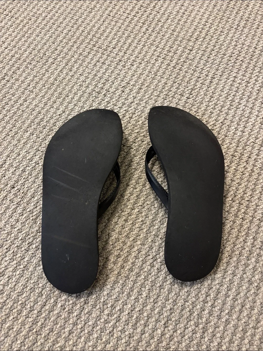 Tory Burch Black Flip Flops with Gold Logo Accent